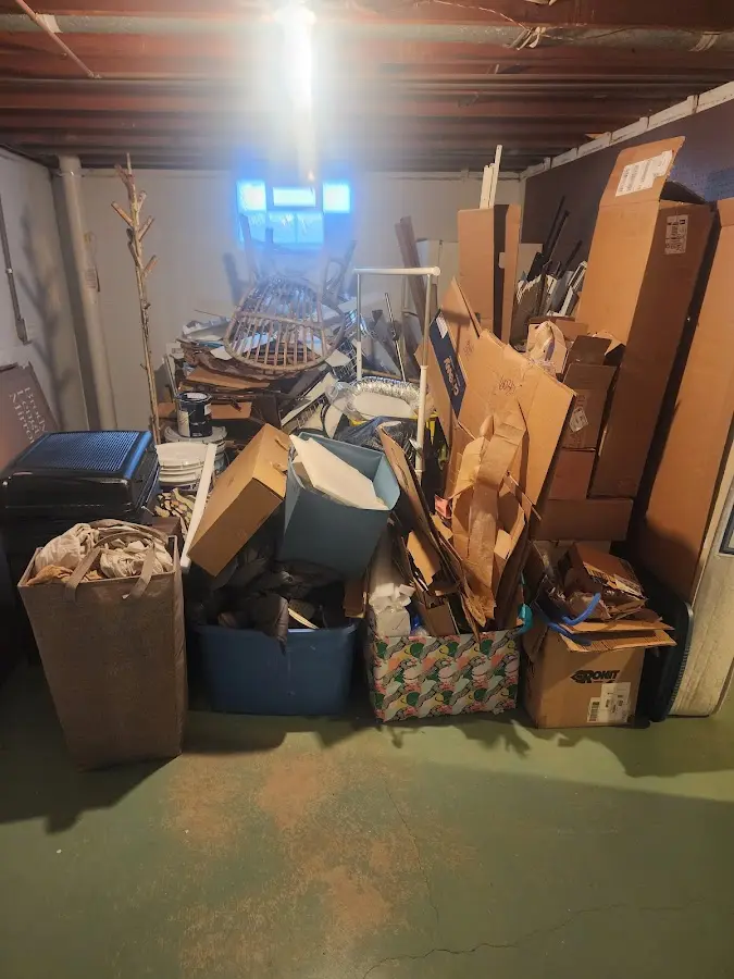 Roll-off dumpster container at job site for 2 Yard Dumpster Rental in Shannon Hills